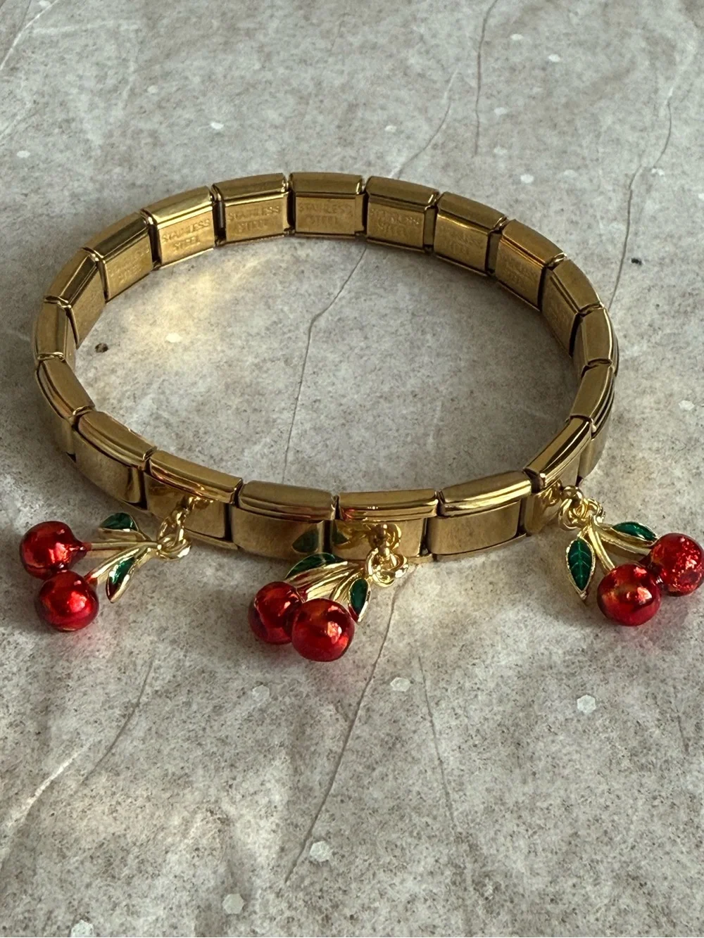 Gold-Tone Stretch Bracelet with Red Cherry Charms